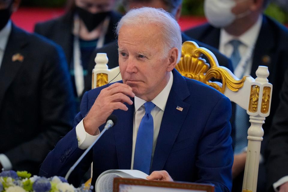 U.S. President Joe Biden listens to a speech from Cambodian Prime Minister Hun Sen during the ASEAN - U.S. summit in Phnom Penh, Cambodia, Saturday, Nov. 12, 2022.