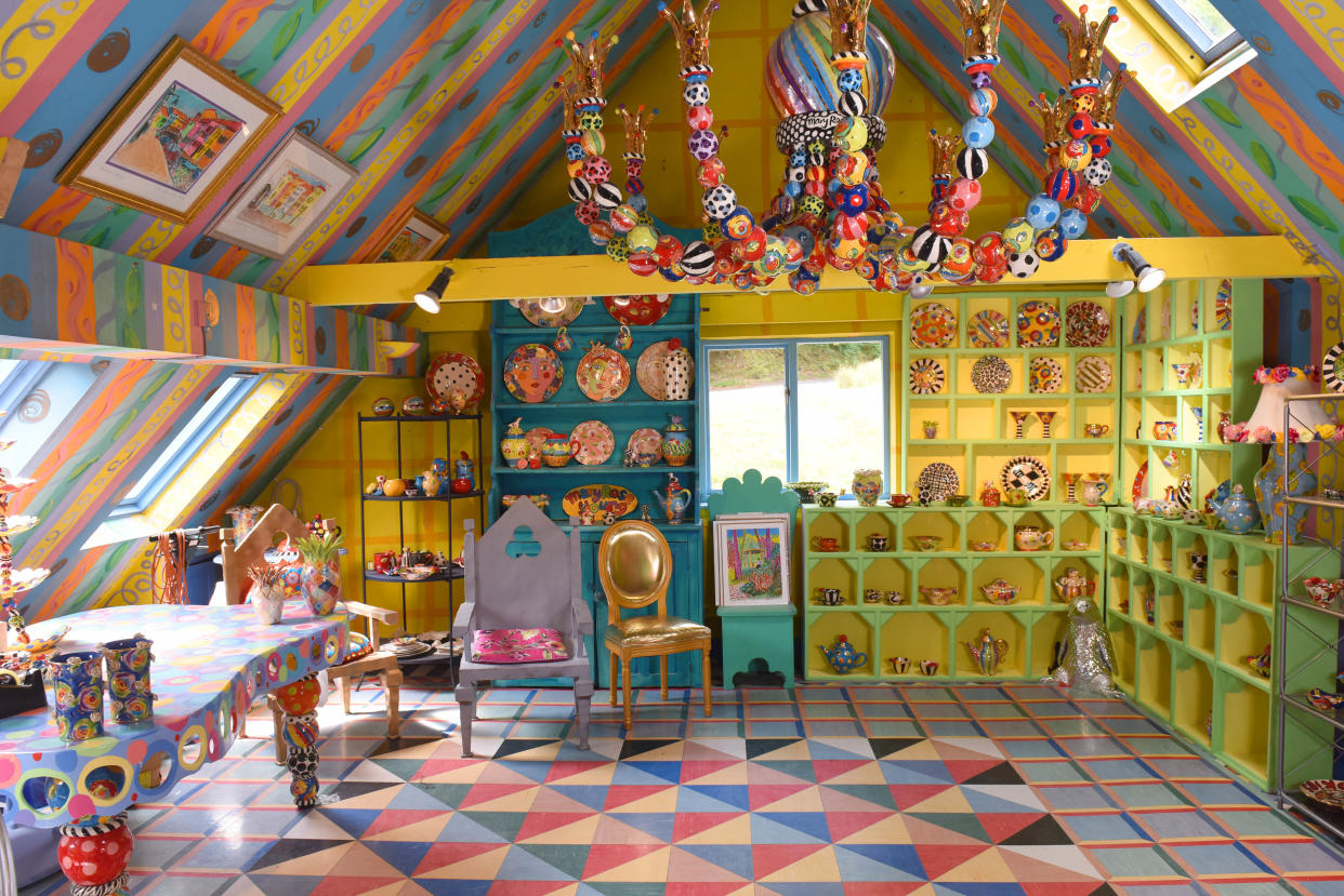 PIC BY MERCURY PRESS (PICTURED Potter, Mary Rose Young, 61 has made her Â£500,000 home unsellable with her eccentric, colourful decor) A woman who spent more than 30 years turning her rundown cottage into a life-size doll house says her colourful decoration has made the house - which should be worth upwards of half a million pounds - unsellable.  Potter, Mary Rose Young, 61, has been painting the beautiful country cottage in leafy Lydney, Gloucs in her electric style by hand since 1987, when she bought the former squatterâs house for just Â£30,000. After 27 years in the house, she put it on the market in 2014, where estate agents said the property should have been expected to fetch at least Â£500,000. But despite hoping to sell the property to open a B&B nearby, estate agents could only persuade one person to view the house - leaving the family stuck there. SEE MERCURY COPY