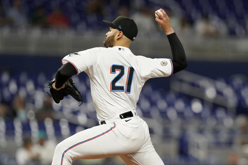 Miami Marlins starting pitcher Pablo Lopez wears a jersey with No. 21 in honor of Roberto Clemente Day as he throws during the second inning of a baseball game against the Philadelphia Phillies, Thursday, Sept. 15, 2022, in Miami. Lopez is the Marlins' nominee for the Roberto Clemente award. (AP Photo/Lynne Sladky)