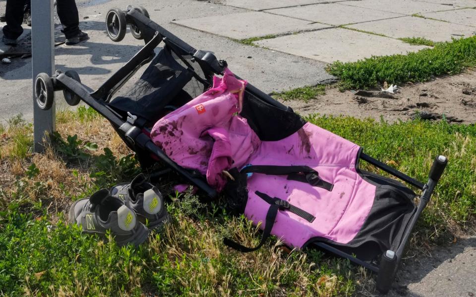 Blood stains on a baby stroller after a deadly Russian missile attack in Vinnytsia - Efrem Lukatsky/AP