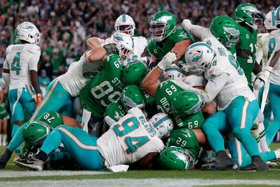 Philadelphia Eagles quarterback Jalen Hurts (1) scores on a Tush Push against the Miami Dolphins during an NFL football game, Sunday, Oct. 22, 2023, in Philadelphia. The Eagles defeated the Dolphins 31-17.