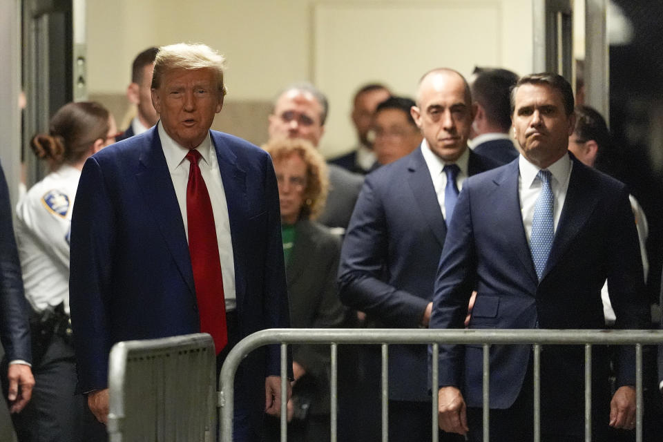 Former President Donald Trump departs Trump Tower to attend a pre-trial hearing in Manhattan criminal court, Monday, March 25, 2024, in New York. A judge will weigh on Monday when the former president will go on trial. (AP Photo/Mary Altaffer, POOL)