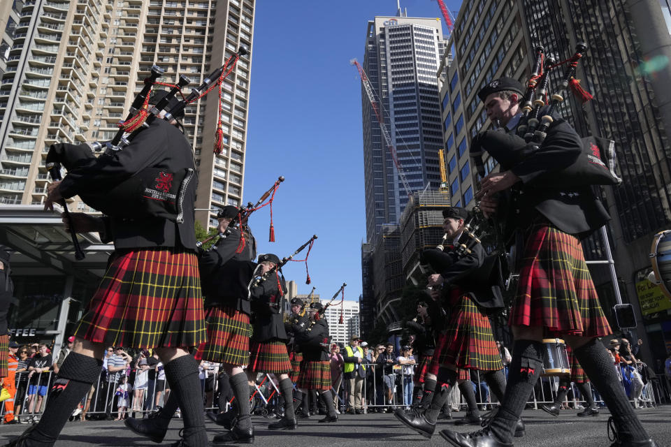 Members of a pipe band march in the Anzac Day parade in Sydney, Tuesday, April 25, 2023. (AP Photo/Rick Rycroft)