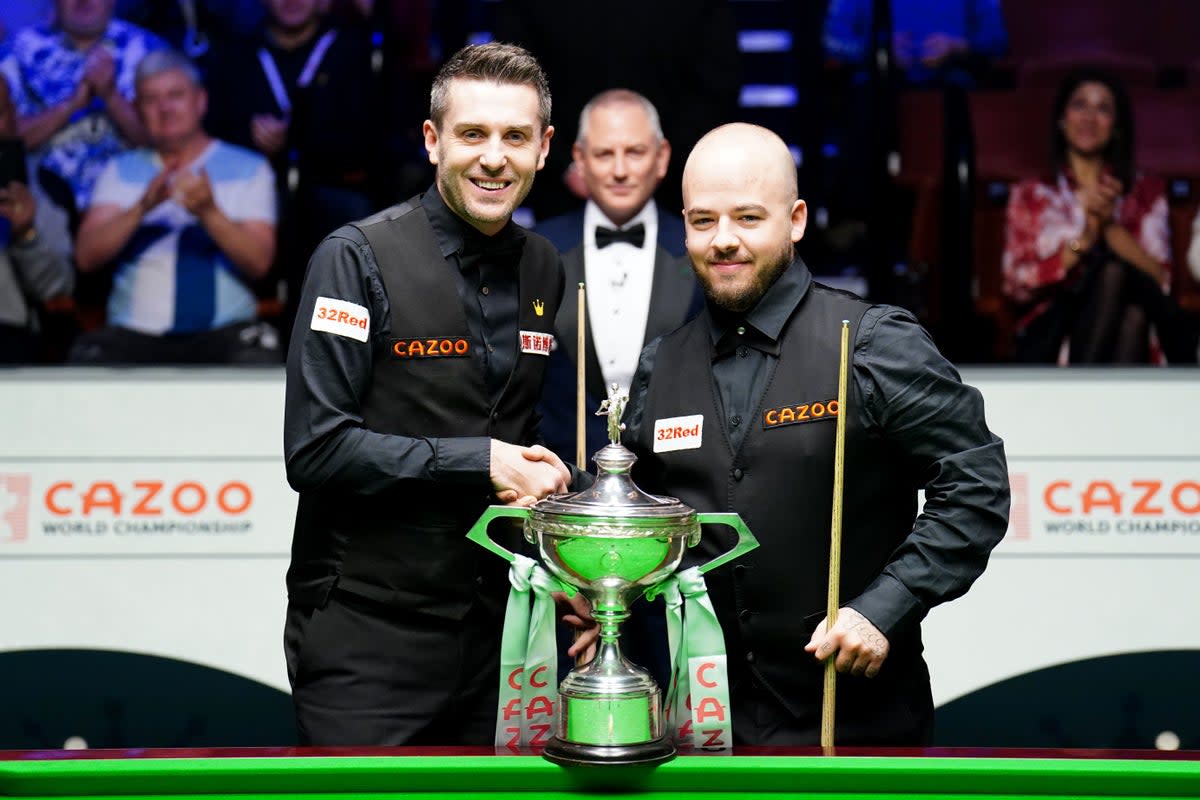Luca Brecel (right) was playing against Mark Selby in the World Snooker Championship  (Zac Goodwin/PAPA Wire)