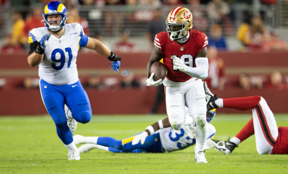 SANTA CLARA, CA - OCTOBER 3: Deebo Samuel #19 of the San Francisco 49ers runs after making a catch during the game against the Los Angeles Rams at Levi's Stadium on October 3, 2022 in Santa Clara, California. The 49ers defeated the Rams 24-9. (Photo by Michael Zagaris/San Francisco 49ers/Getty Images)