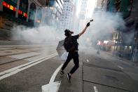 FILE PHOTO: Hong Kong police fire tear gas in feverish start to 22nd weekend of protests in Hong Kong