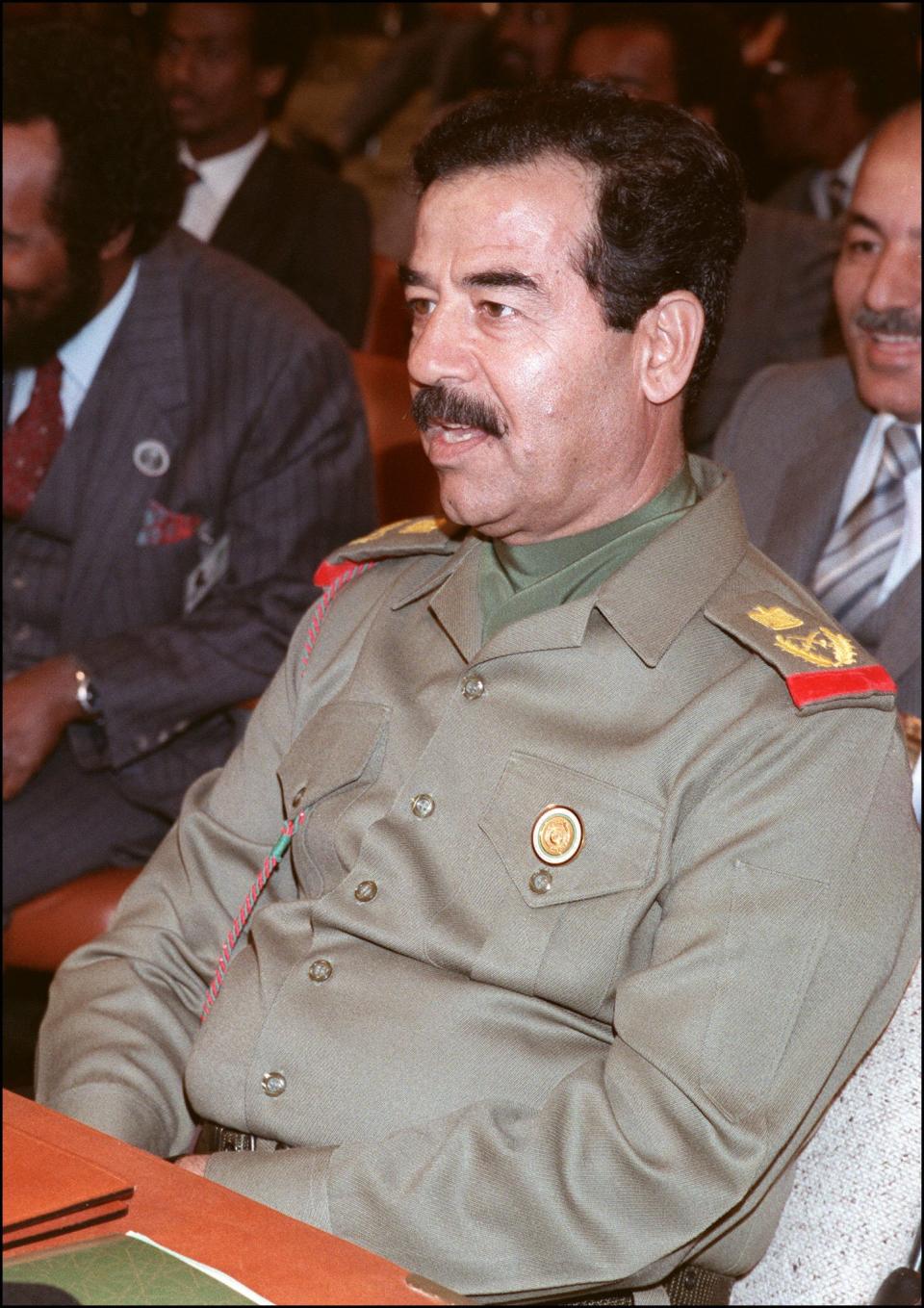 Iraqi President Saddam Hussein 10 November 1987 in Amman during a session of the emergency Arab summit. Saddam took the number two job under president Ahamd Hassan al-Bakr, began purging the army of non-Baathist officers, ridding the political scene of Kurds and communists.