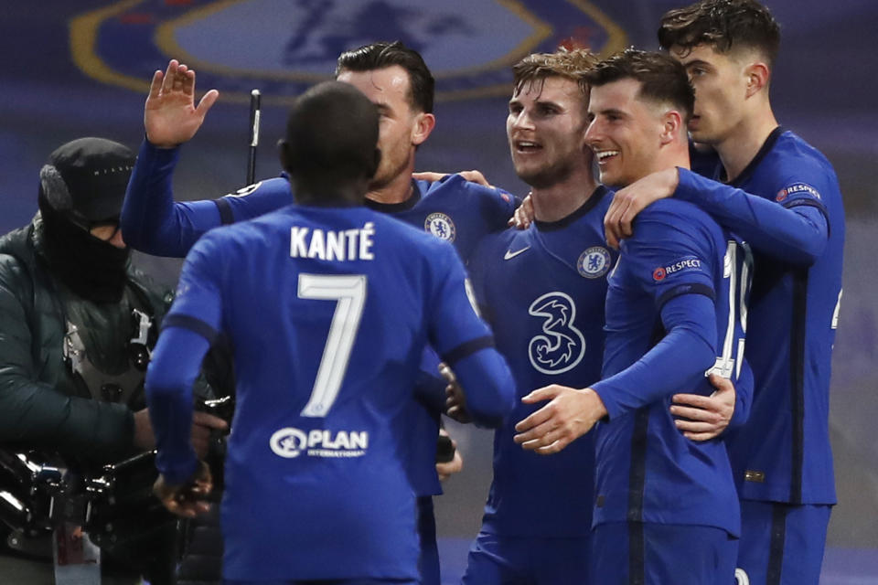 Chelsea's Timo Werner, third from right, celebrates with his teammates after scoring his side's first goal during the Champions League semifinal 2nd leg soccer match between Chelsea and Real Madrid at Stamford Bridge in London, Wednesday, May 5, 2021. (AP Photo/Alastair Grant)