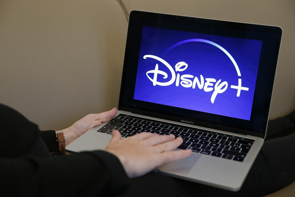 PARIS, FRANCE - NOVEMBER 08: In this photo illustration, the Disney + logo is displayed on the screen of an Apple MacBook Pro computer on November 08, 2019 in Paris, France. The Walt Disney Company will launch its streaming service (Svod) Disney plus in the United States on November 12, 2019, for Europe, it will be necessary to wait until the beginning of the year 2020. (Photo by Chesnot/Getty Images)