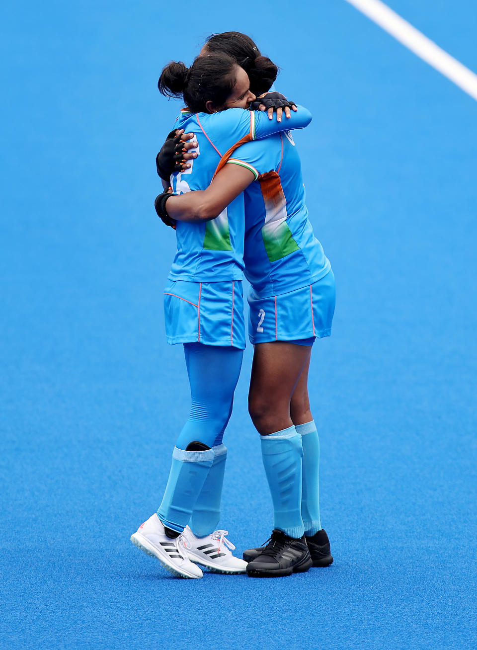 TOKYO, JAPAN - AUGUST 02: (EDITOR’S NOTE: Alternative crop of image #1331883627) Gurjit Kaur and Nisha of Team India react after their 1-0 win after the Women's Quarterfinal match between Australia and India on day ten of the Tokyo 2020 Olympic Games at Oi Hockey Stadium on August 02, 2021 in Tokyo, Japan. (Photo by Buda Mendes/Getty Images)