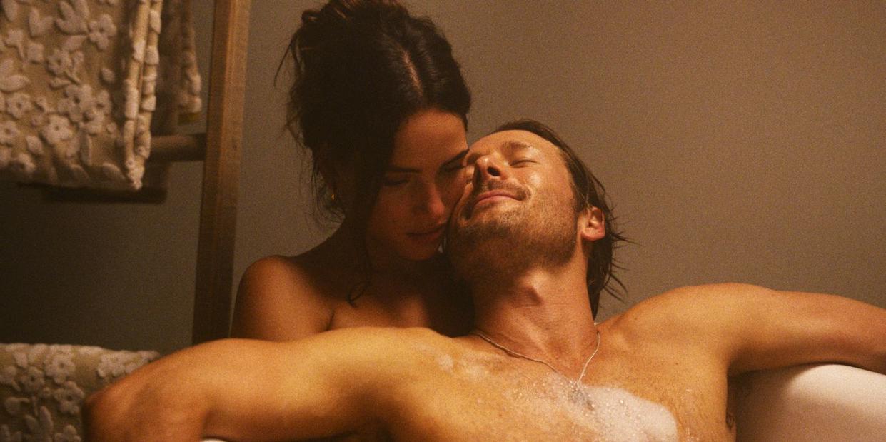 adria arjona and glen powell in netflix movie hit man