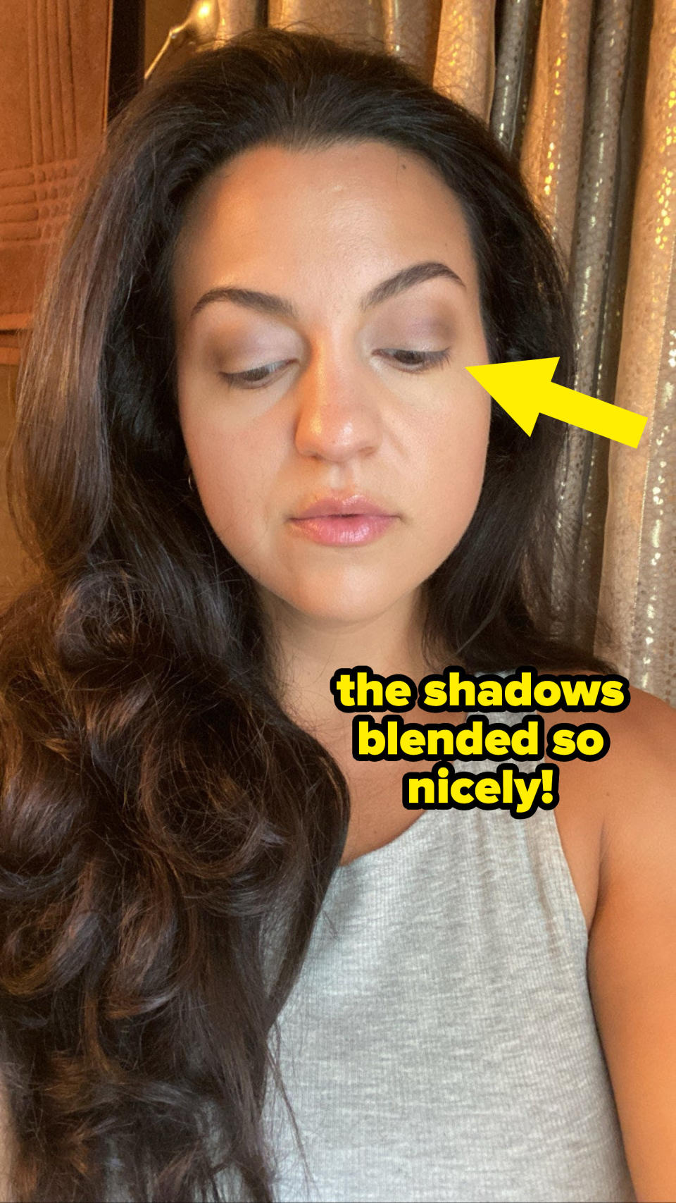 the author with the eyeshadow on and the words "The shadows blended so nicely!"