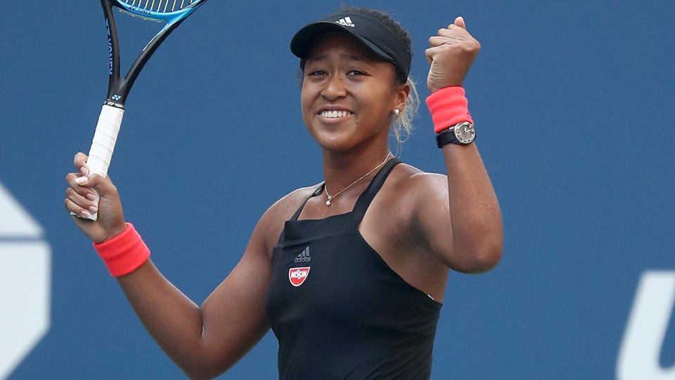 Naomi Osaka celebrates match point during the women’s singles fourth round match against Aryna Sabalenka. (Photo by Julian Finney/Getty Images)