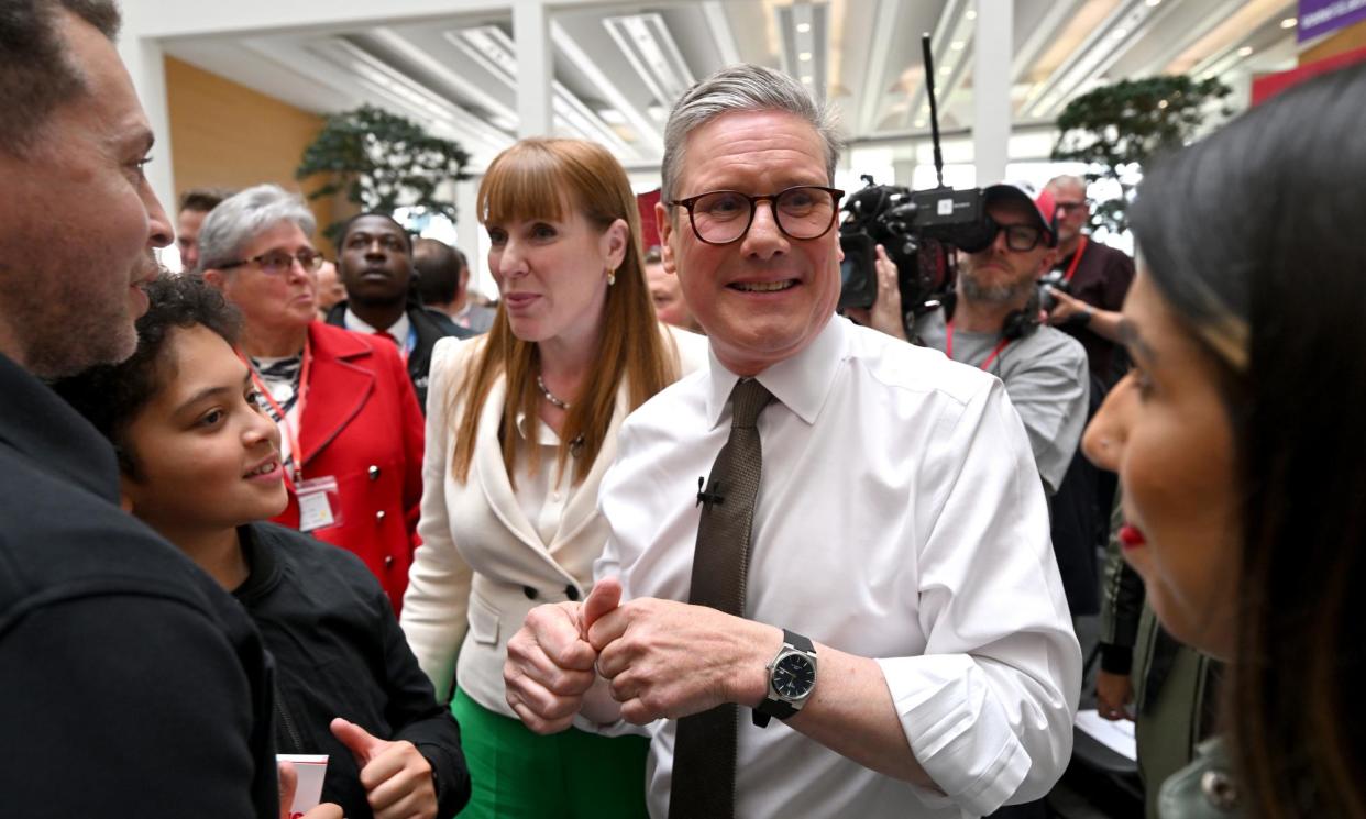 <span>Keir Starmer and Angela Rayner at the launch of Labour's manifesto, which promises an ‘ambitious’ strategy to reduce child poverty.</span><span>Photograph: Anthony Devlin/Getty Images</span>