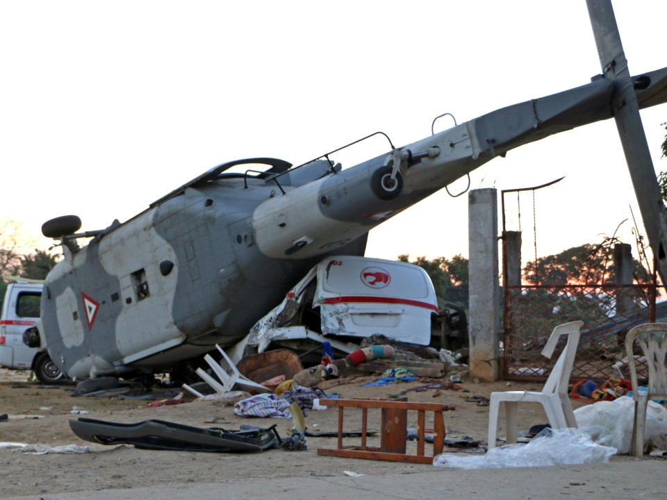 The remains of the military helicopter that fell on a van in Santiago Jamiltepec: Patricia Castellanos/AFP/Getty Images