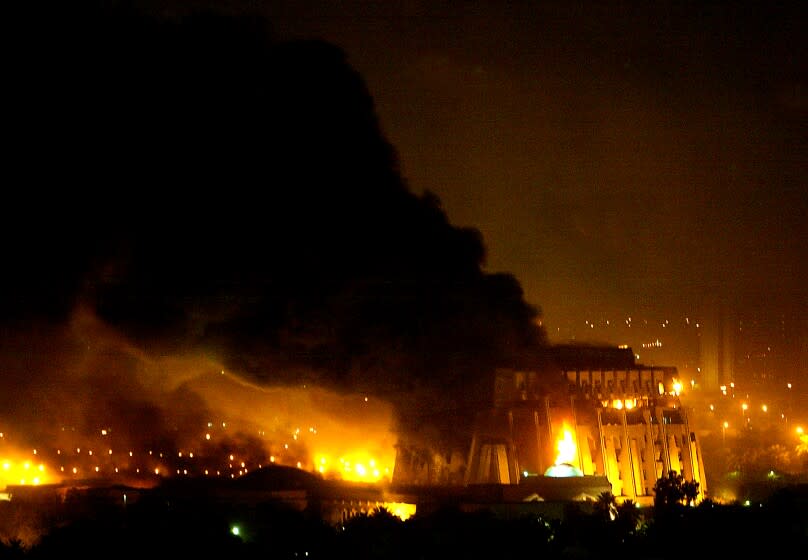 061908.MN.0321.Baghdad.4.CMC...BAGHDAD, IRAQ - MARCH 20, 2003 - On the third night of the U.S. war on Iraq, heavy bombing took place in the area of the Presidential Compound in central Baghdad. Dozens of explosions rocked the area, as smoke and fire filled the night sky. The Special Security headquarters was one of the heaviest hit.