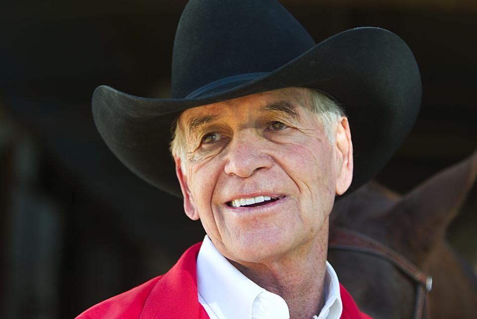 Robert C. Norris, the original Marlboro Man who ranched part of the year in the North Valley at his T-Cross Ranch in North Phoenix, is seen in this Nov. 19, 2003, file photo. He died Sunday at the age of 90.