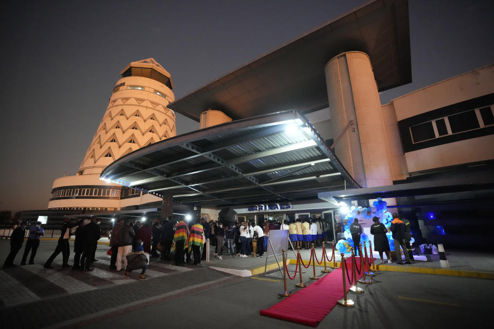 A redcarpet is laid out to welcome the Zimbabwean high school World and European moot court competition champions as they arrive back at the Robert Mugabe International airport in Harare, Thursday, July, 7, 2022. A history-making team of Zimbabwean high school students that became world and European moot court competition champions has been widely praised in a country where the education system is beset by poor funding, lack of materials and teachers’ strikes. (AP Photo/Tsvangirayi Mukwazhi)