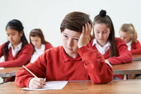 <span class="caption">Struggling to keep up.</span> <span class="attribution"><a class="link " href="https://www.shutterstock.com/image-photo/male-pupil-finding-school-exam-difficult-432363745?src=JvVElrfuRTkggUa0ed8KOA-1-23" rel="nofollow noopener" target="_blank" data-ylk="slk:SpeedKingz/Shutterstock;elm:context_link;itc:0;sec:content-canvas">SpeedKingz/Shutterstock</a></span>