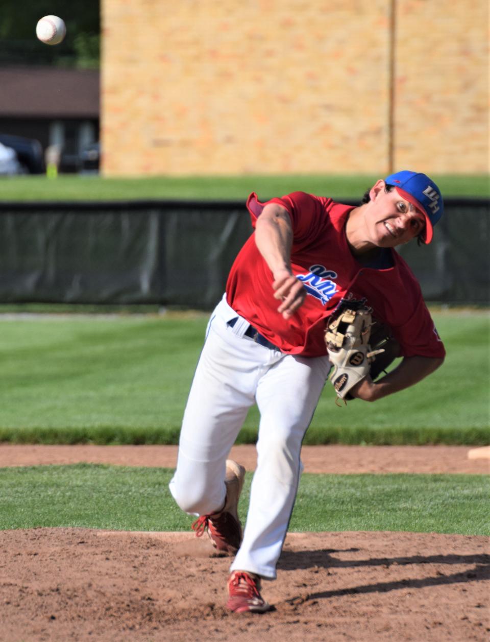 West Holmes junior pitcher Nick Ginsburg delivers against New Philadelphia in the East District final. Ginsburg held the Quakers to three hits, but the Knights fell 2-1.