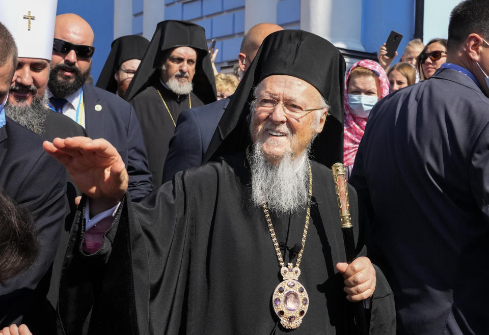 Ecumenical Patriarch Bartholomew I, blesses parishioners at the Mikhailovsky Zlatoverkhy Cathedral (St. Michael's Golden-Domed Cathedral) in Kyiv, Ukraine, Saturday, Aug. 21, 2021. Bartholomew I, arrived to Kyiv to mark the 30th anniversary of Ukraine's independence that is celebrated on Aug. 24. (AP Photo/Efrem Lukatsky)