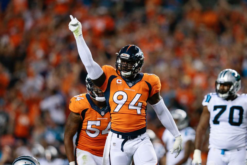 Broncos outside linebacker DeMarcus Ware celebrates after a third-quarter play at home against the Carolina Panthers.