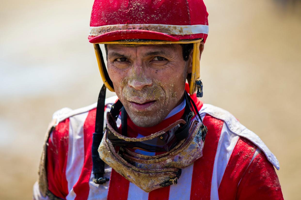 Jockey Jesus Castanon exits the track following the MCM CPA's and Advisors' Dash at the Downs race during the Thurby event at Churchill Downs that caters to Louisville locals. May 2, 2019