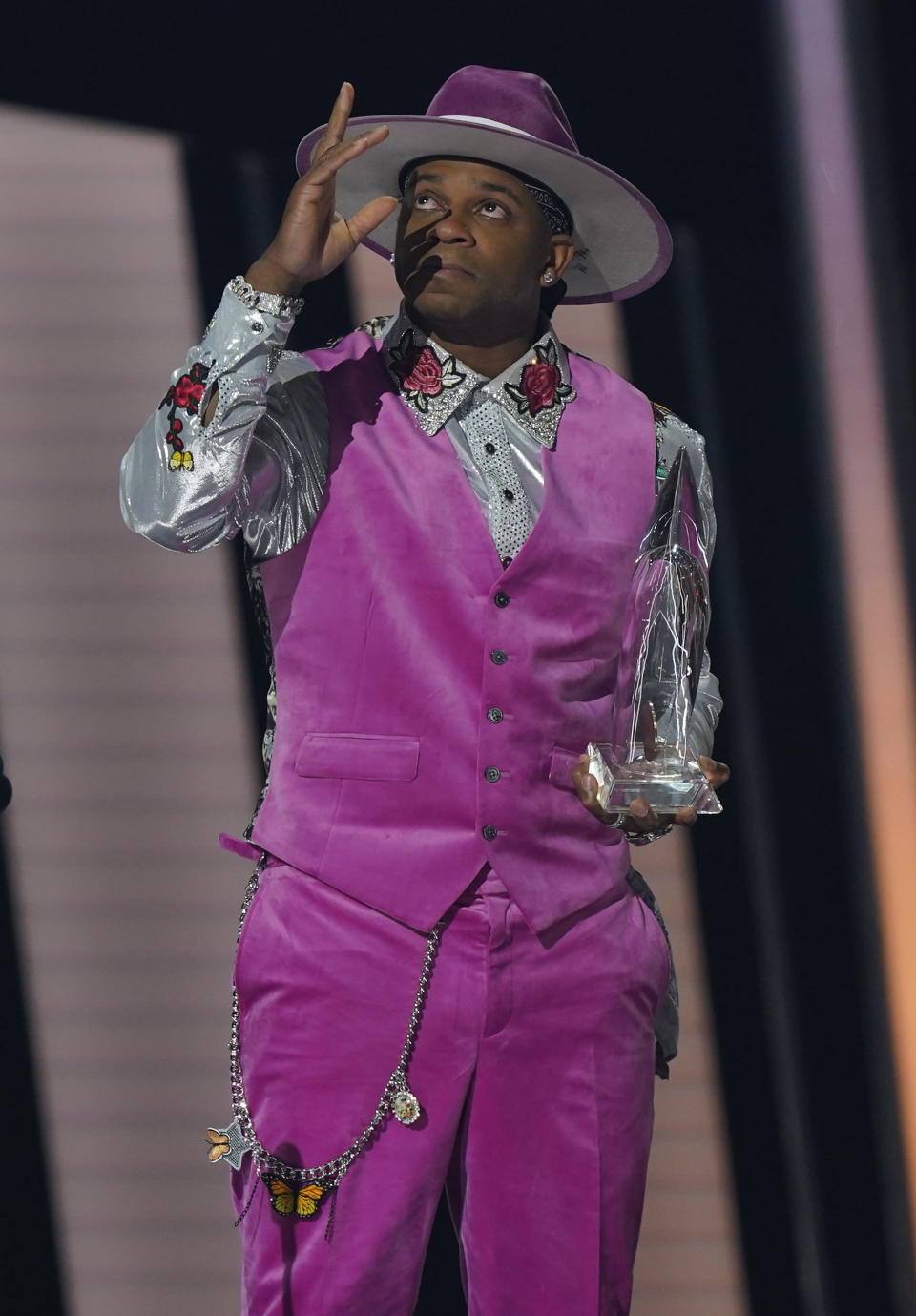 Jimmie Allen reacts as he accepts the new artist of the year award at the 55th annual CMA Awards on Wednesday, Nov. 10, 2021, at the Bridgestone Arena in Nashville, Tenn. (AP Photo/Mark Humphrey)