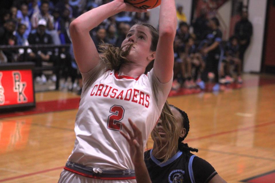 Bishop Kenny forward Clare Coyle (2) goes up for a layup against Ribault.