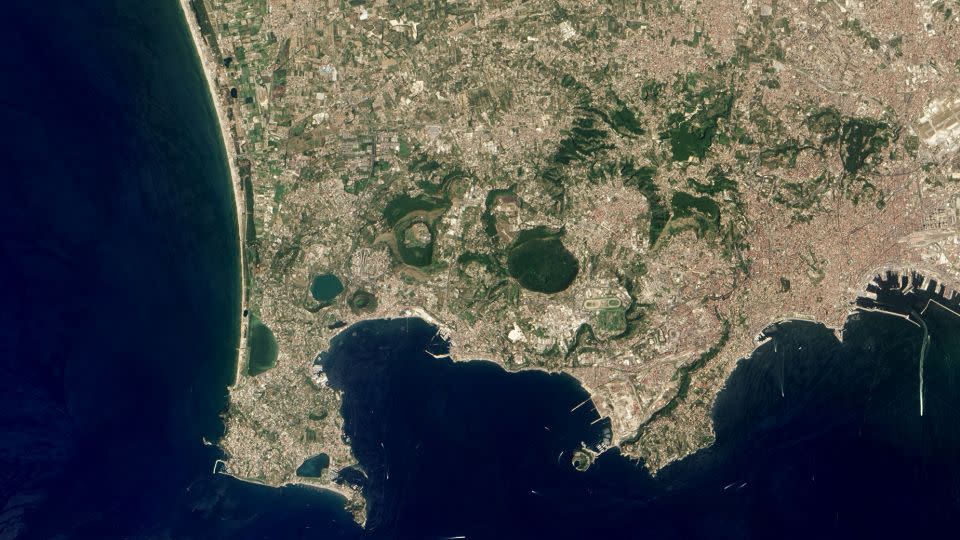 Campi Flegrei, a large dormant volcano near Naples, has a history of eruptions, and the last one was in 1538. Recently, increased seismic activity and rising land levels have raised concerns among local residents. - Jesse Allen/Robert Simmon/NASA