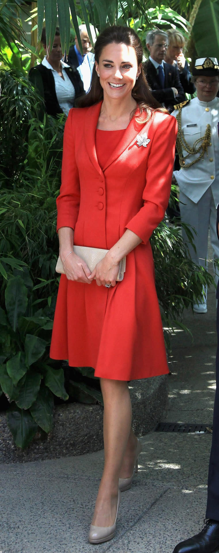 <p>Kate said goodbye to Canada in a red Catherine Walker ensemble paired with L.K. Bennett heels and clutch.</p><p><i>[Photo: PA]</i></p>
