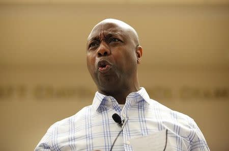 U.S. Senator Tim Scott (R-SC) reacts to a harsh statement from an audience member at a town hall meeting for constituents in North Charleston, South Carolina, U.S. February 25, 2017. REUTERS/Randall Hill