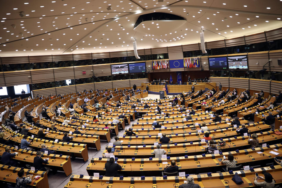 FILE - In this Wednesday, Sept. 16, 2020 file photo, European Commission President Ursula von der Leyen addresses the plenary at the European Parliament in Brussels. Britain and the European Union have struck a provisional free-trade agreement that should avert New Year chaos for cross-border traders and bring a measure of certainty for businesses after years of Brexit turmoil. (AP Photo, Francisco Seco, File)