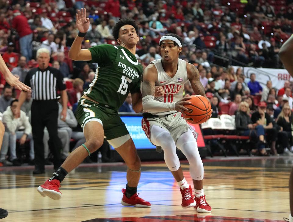 Iowa State men's basketball got a much-needed backcourt transfer from the portal Sunday. He's former UNLV starter Keshon Gilbert, seen here driving around a defender.