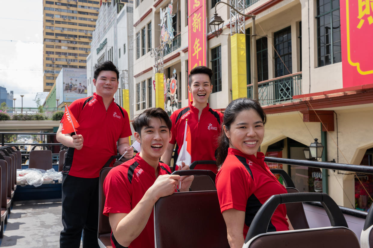 Top Singapore athletes (from left) Aloysius Yapp, Loh Kean Yew, Shayna Ng and Yip Pin Xiu during the celebratory open-top bus parade organised by the Singapore Sports Institute. (PHOTO: Sport Singapore)