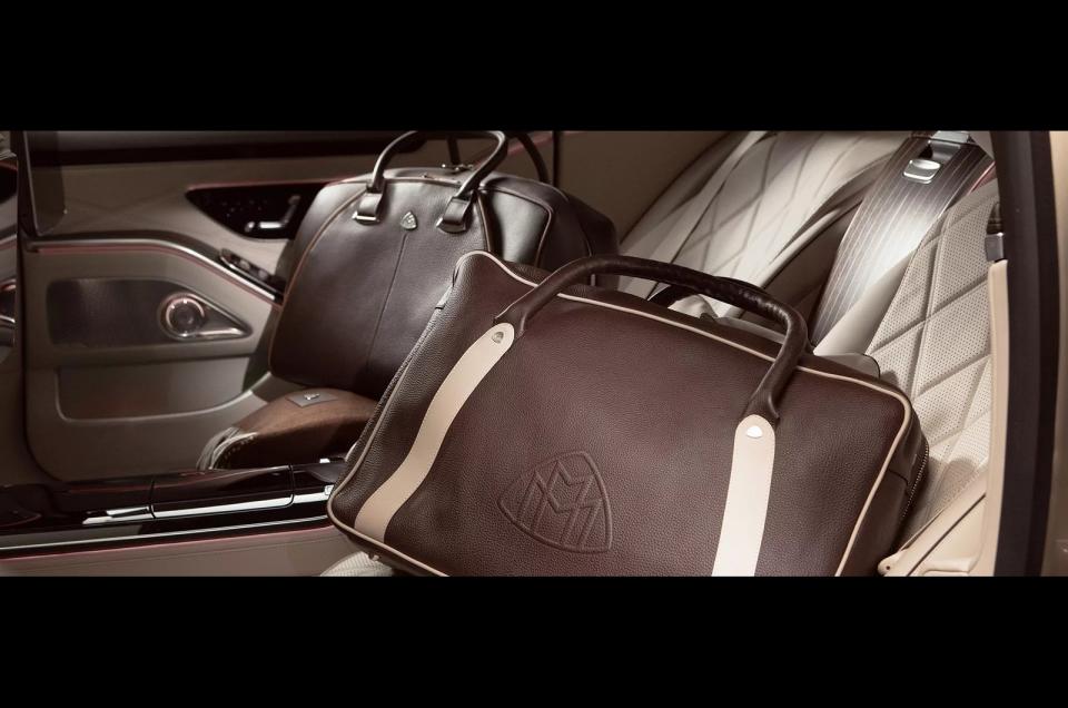 <p>Sunglasses, a suit, a chauffeur and an important place to be — owning a Maybach means that you’ll get to your destination in luxury, but if you really wanted to be noticed, then why wouldn’t you opt for a branded bag as well? There are quite a few to choose from to match the interior of your Maybach and various sizes available. All come with the Maybach logo, and if you fancy the one in our slide, you’ll be <strong>£3,855</strong> lighter.</p>