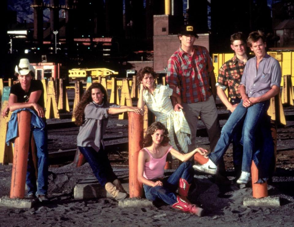 Jim Youngs (from left), Sarah Jessica Parker, Elizabeth Gorcey, Lori Singer (seated), John Laughlin, Christopher Penn and Kevin Bacon on the set of “Footloose.” ©Paramount/Courtesy Everett Collection