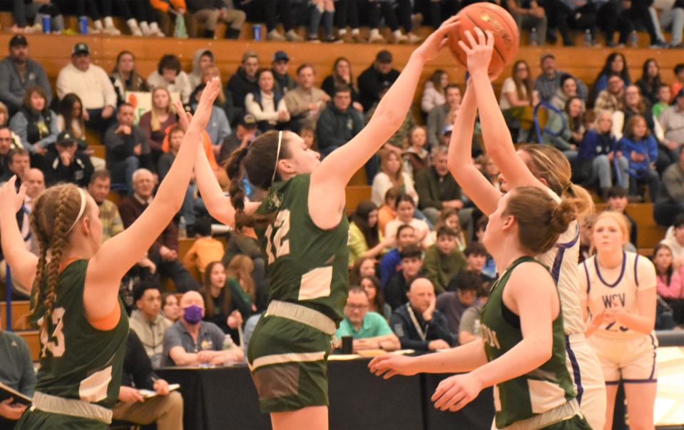 Hamilton Emerald Knight Reagan Hope (12) blocks a West Canada Valley shot during the first half of Saturday's Section III semifinal.