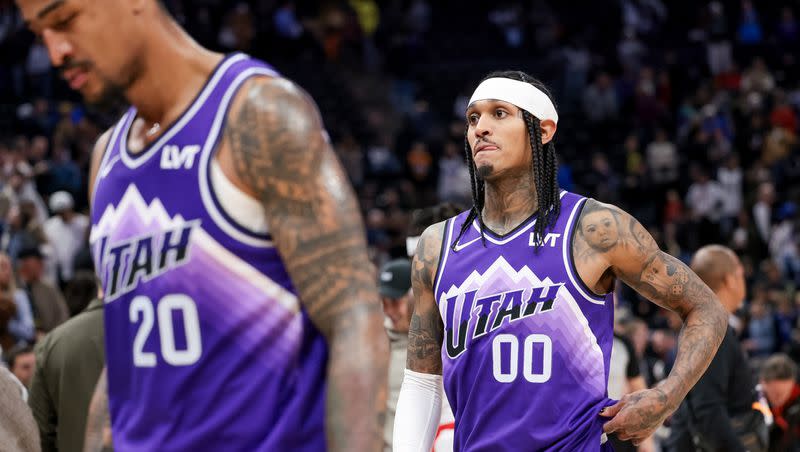 Utah Jazz forward John Collins (20) and guard Jordan Clarkson come off the court after losing to the LA Clippers at the Delta Center in Salt Lake City on Friday, Dec. 8, 2023.