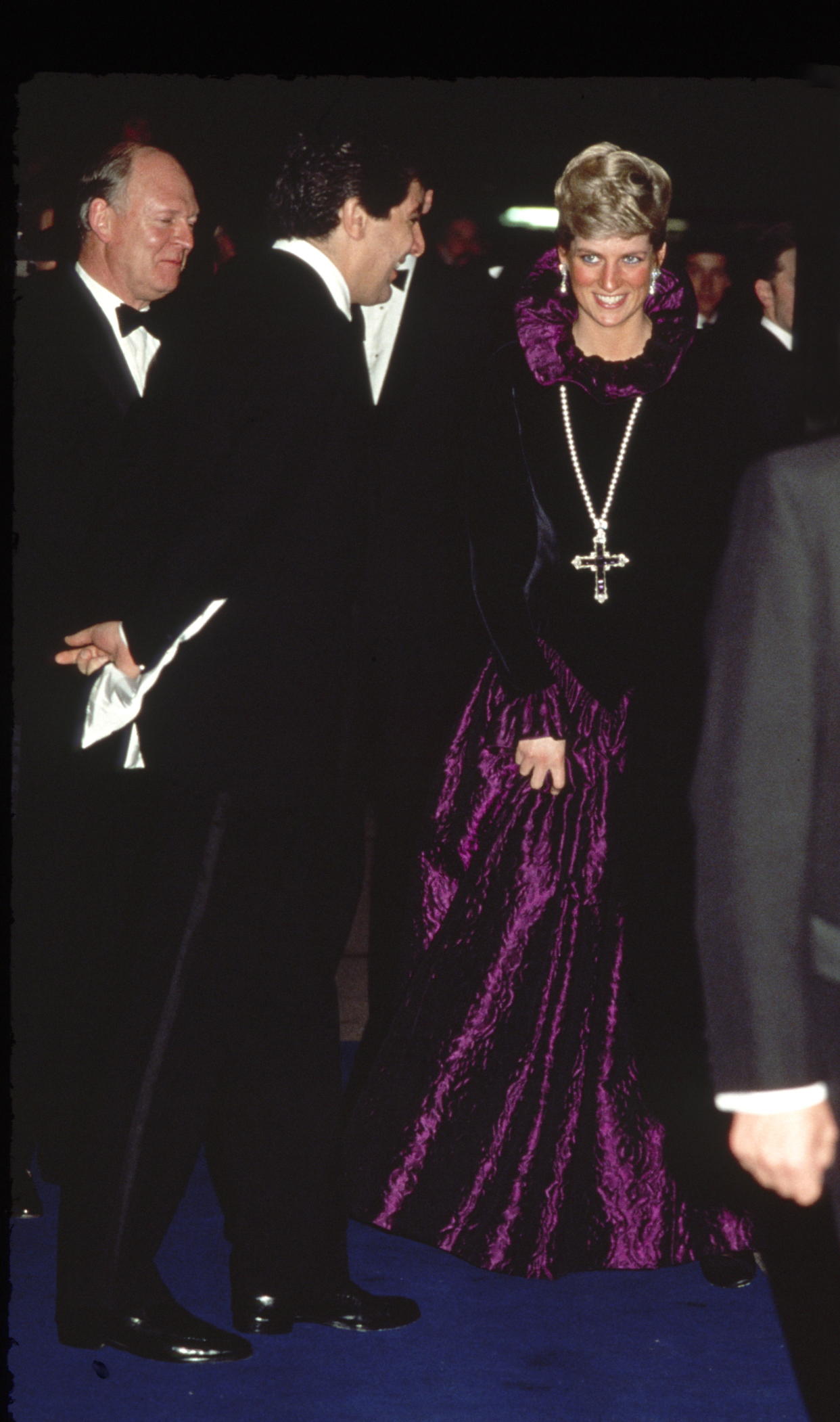 Diana, Princess Of Wales, arriving at a charity gala wearing the cross necklace in 1987. (Getty Images)