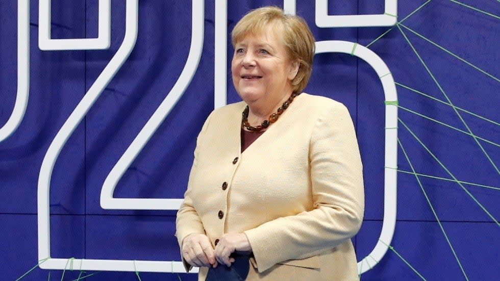 Germany's Chancellor Angela Merkel arrives for the COP26 summit