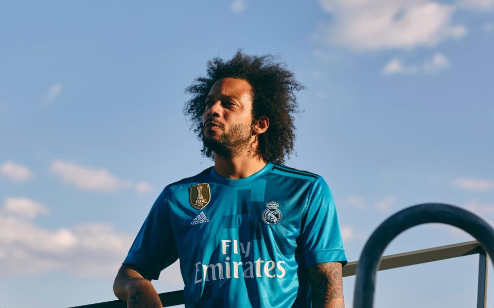 Real Madrid's Marcelo poses in their pixellated third kit - Credit: ADIDAS