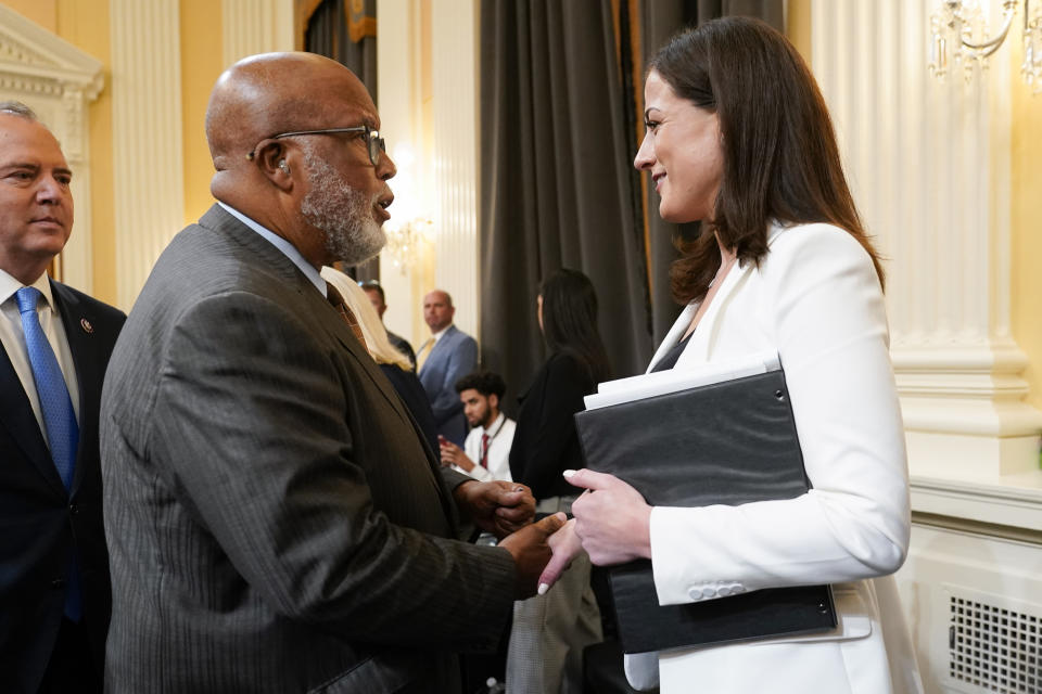 FILE - Chairman Bennie Thompson, D-Miss., talks with Cassidy Hutchinson, former aide to Trump White House chief of staff Mark Meadows, after she testified as the House select committee investigating the Jan. 6 attack on the U.S. Capitol held a hearing at the Capitol in Washington, June 28, 2022. The Jan. 6 congressional hearings have paused, at least for now, and Washington is taking stock of what was learned about the actions of Donald Trump and associates surrounding the Capitol attack.(AP Photo/J. Scott Applewhite, File)