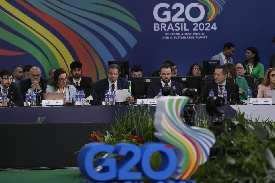 Brazilian Finance Minister Fernando Haddad, center, speaks during the G20 Finance Ministers and Central Bank Governors meeting in Sao Paulo, Brazil, Thursday, Feb. 29, 2024. (AP Photo/Andre Penner)