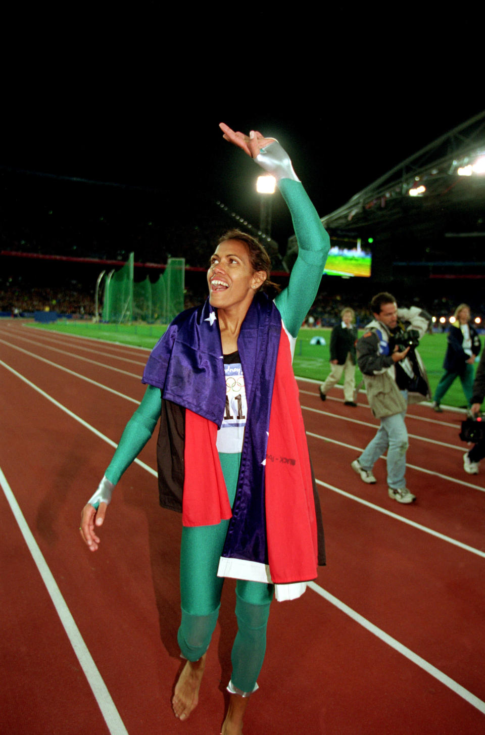 Cathy Freeman will have fond memories of the 2000 Olympic Games at Sydney for two reasons - she lit the Olympic Flame and also won the gold medal in the women's 400 metres. This made Freeman only the second Australian Aboriginal Olympic champion (the first was Nova Peris-Kneebone for field hockey in Atlanta). After the race, Freeman took a victory lap, carrying both the Aboriginal and Australian flags.