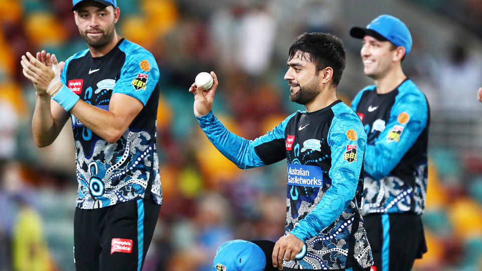 Rashid Khan, pictured here after taking six wickets for the Adelaide Strikers against Brisbane Heat.
