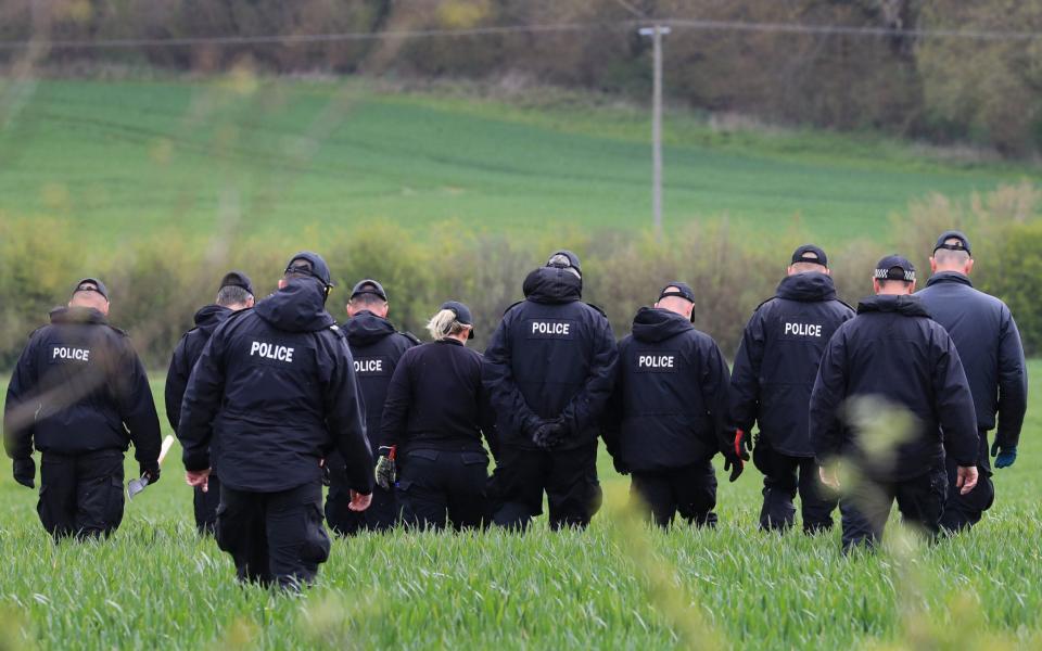 Police search teams are continuing to scour the area where the PCSO's body was found