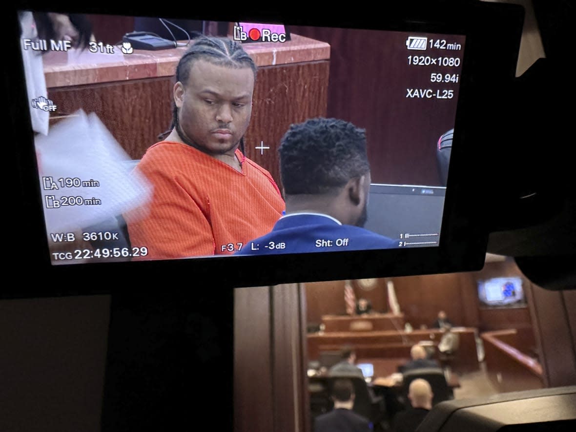 Patrick Xavier Clark, accused of fatally shooting rapper Takeoff last month outside a Houston bowling alley, is displayed on camera monitor during a court appearance, Wednesday, Dec. 14, 2022, in Houston. (AP Photo/Lekan Oyekanmi)