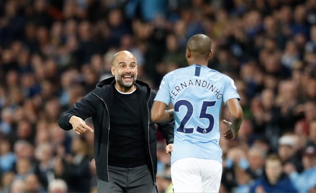 Guardiola (left) is confident Fernandinho will stay at the Etihad beyond his current deal 