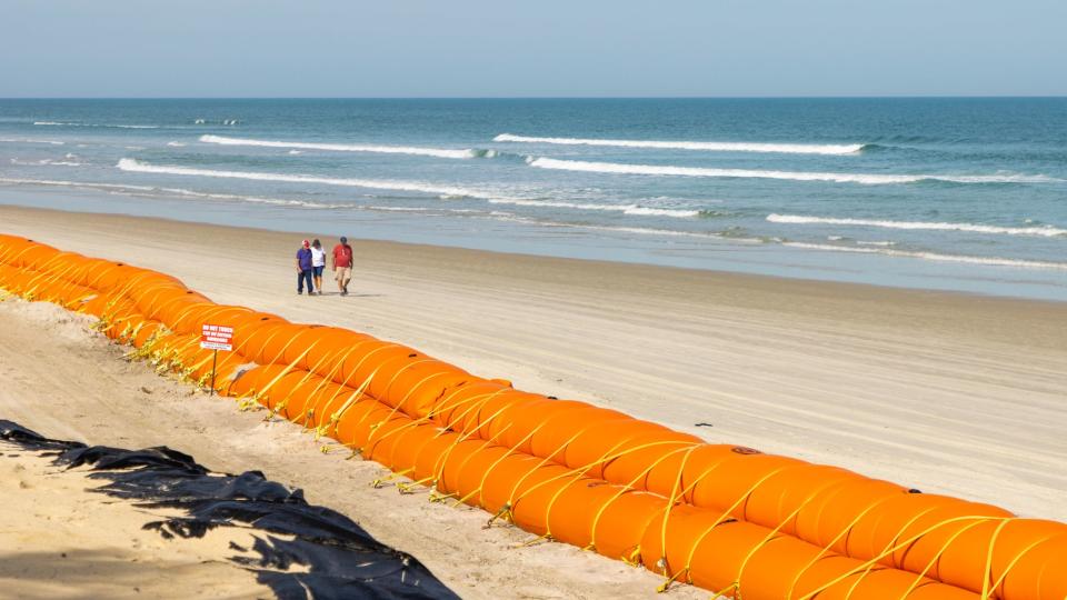 Coastal property owners anxiously wait for permits to begin dune restoration